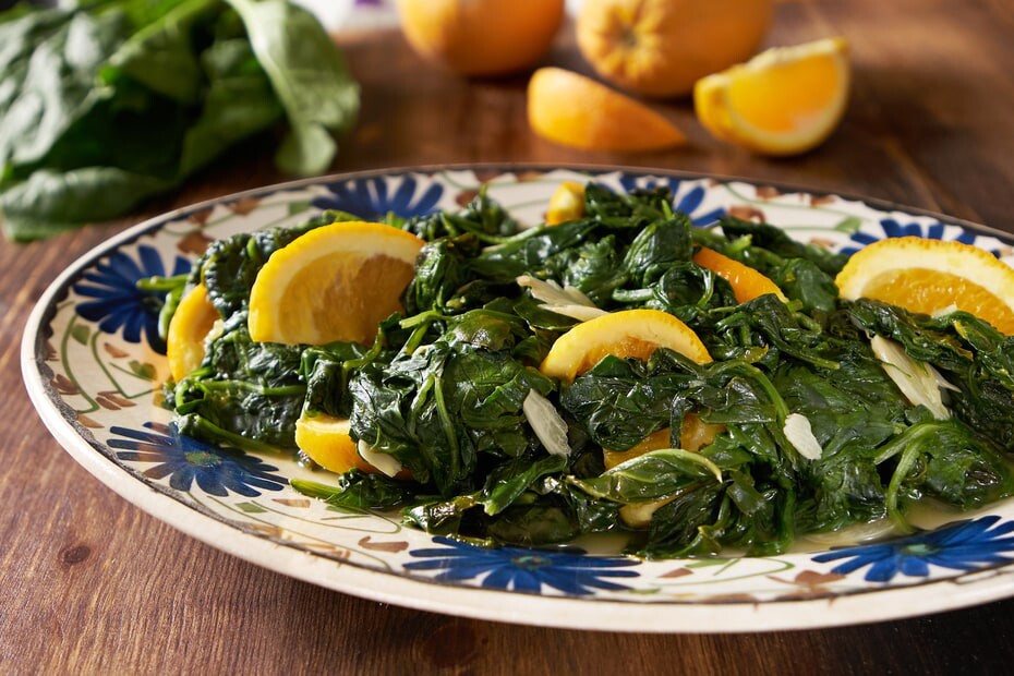 spinach cooked with oranges and garlic