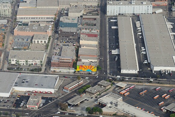 Mural from the air, showing how it becomes welcome to the Arts District. The city also designates the corner as the Downtown Industrial District. | Photo: MOCA.