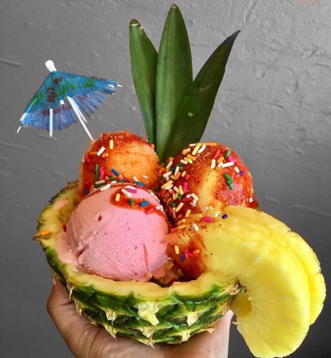 Triple scoop pineapple sundae with exotic fruit vegan and dairy flavors | Courtesy of Helados Pops
