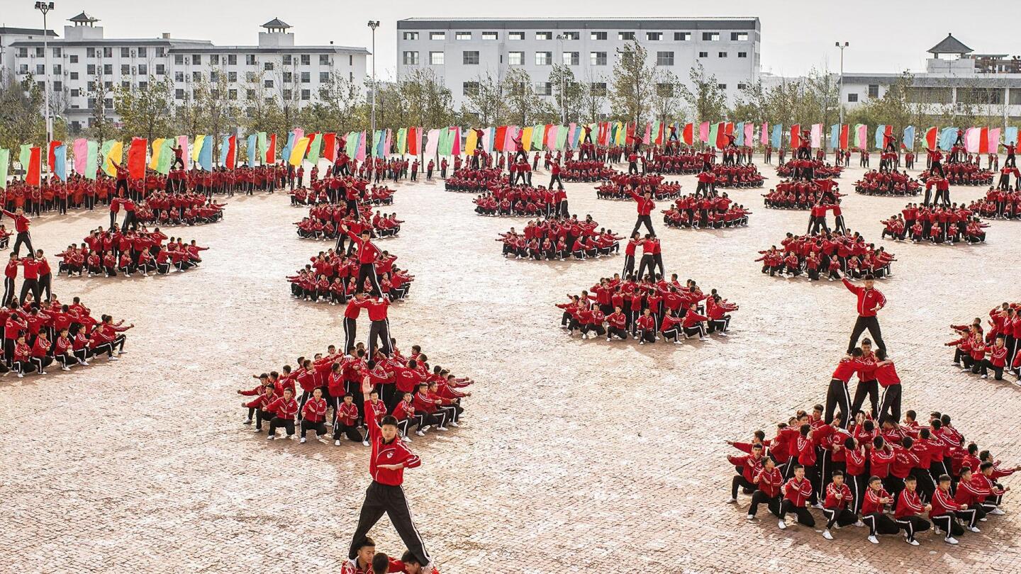 Thousands of Shaolin Kung-Fu students performing in perfect synchronicity.