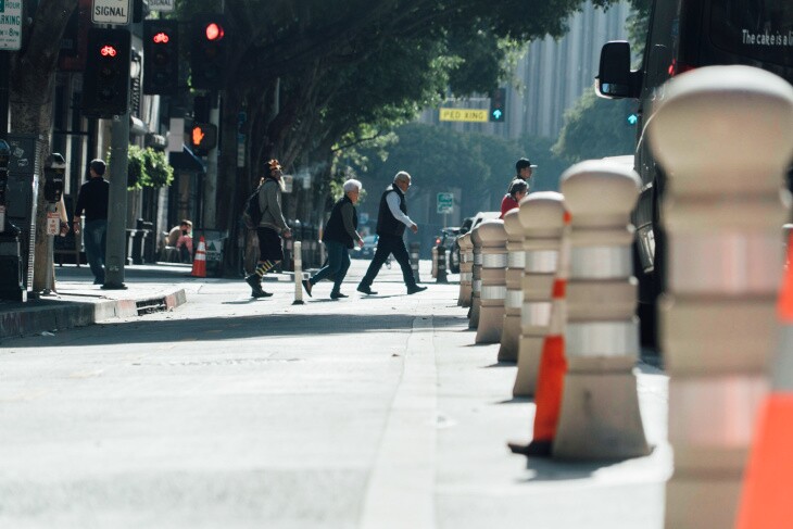 Pedstrians in downtown Los Angeles, prior to coronavirus physical distancing guidelines. | Al Kamalizad for LAist