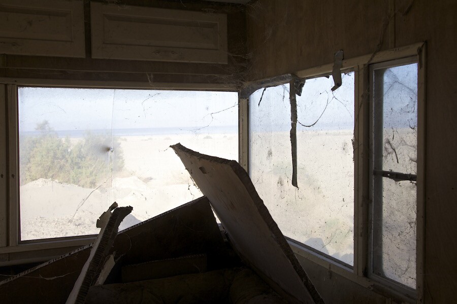 "Window View - Abandoned Mobile Home." Salton Sea, CA. 2014. | Photo: Osceola Refetoff.