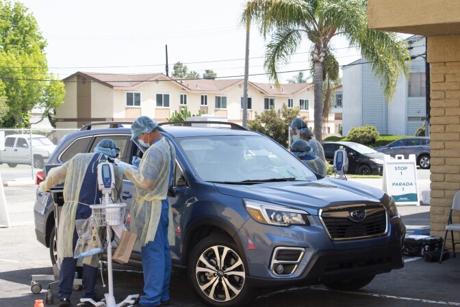 Health workers at a COVID-19 testing site in Huntington Beach. | Courtesy of Altamed
