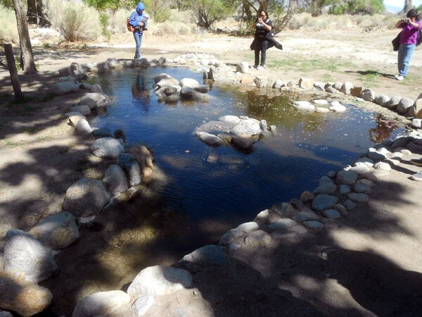 The Arai family fish pond in Manzanar's Block 33, filled with water for the first time since 1945.