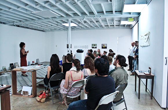 Patricia Fernández, "Points of Departure (between Spain and France)," performative lecture, May 2, 2014. Artist Lab Residency at 18th Street Arts Center, April 14-June 27, 2014. Photo by Erica Rodriguez. Courtesy of 18th Street Arts Center.