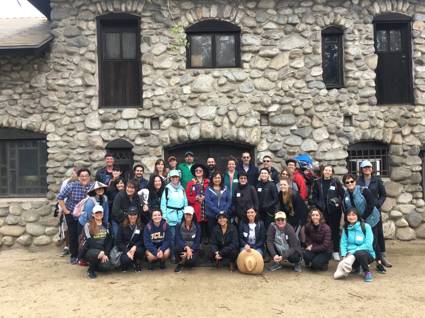 The people who participated at the #LA4Corners walk gather to pose in front of the Charles Lummis House in 2020.