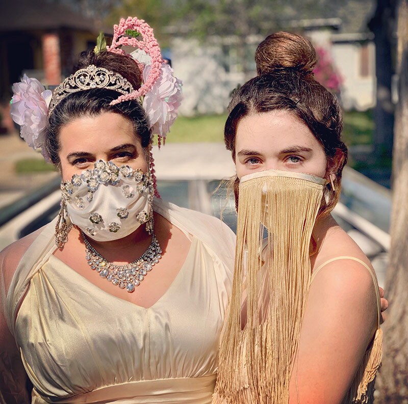 Two women wear face masks made for a home version of The Met Gala. | Image submitted by Añalisa Siemsen-McQuaide to the Autry.
