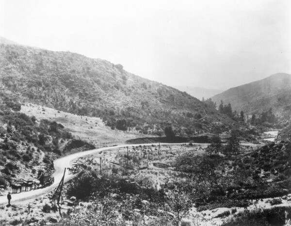 The Cahuenga Pass circa 1905, when only a modest wagon road cut through the gap in the mountains. Courtesy of the USC Libraries - California Historical Society Collection.
