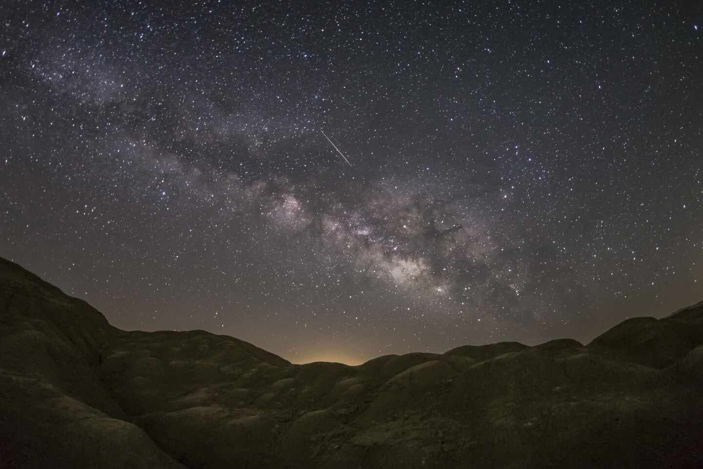 The Lyrid meteor shower with a view of the Milky Way.