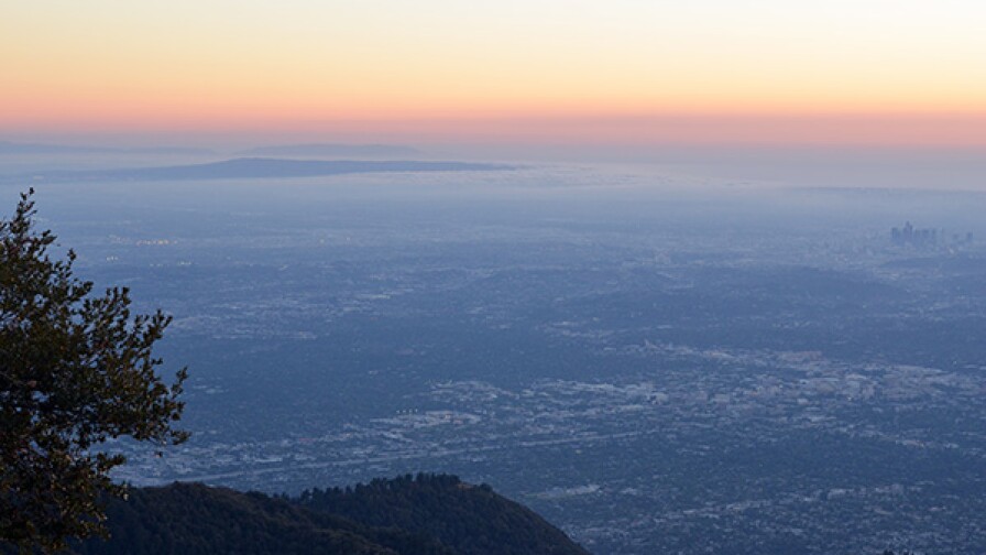 The view from atop Mount Wilson. Catalina Island can be seen top left, and the downtown Los Angeles skyline is visible far right. The entire city of Pasadena is visible in the lower half of the picture. | Photo: Elson Trinidad