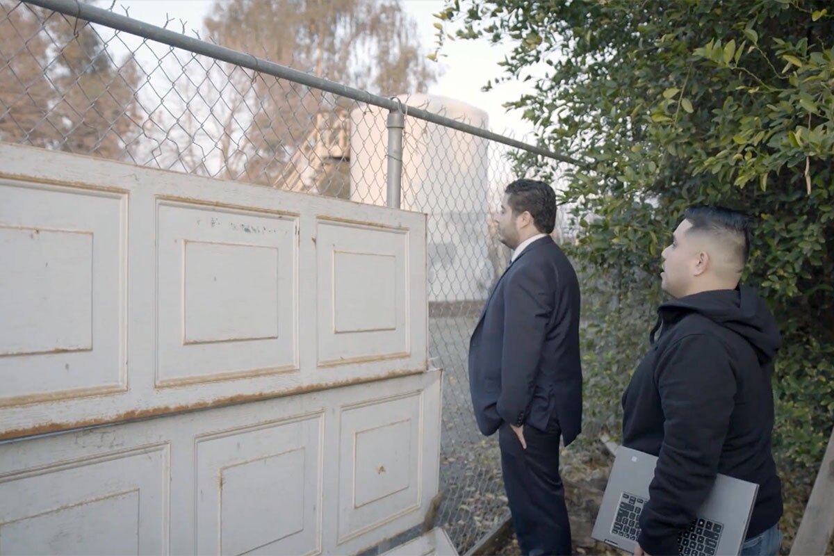 Gustavo Aguirre, Jr. of the Central California Environmental Justice Network shows Arvin Mayor Jose Gurrola the site of a gas leak. | Still from "Earth Focus"