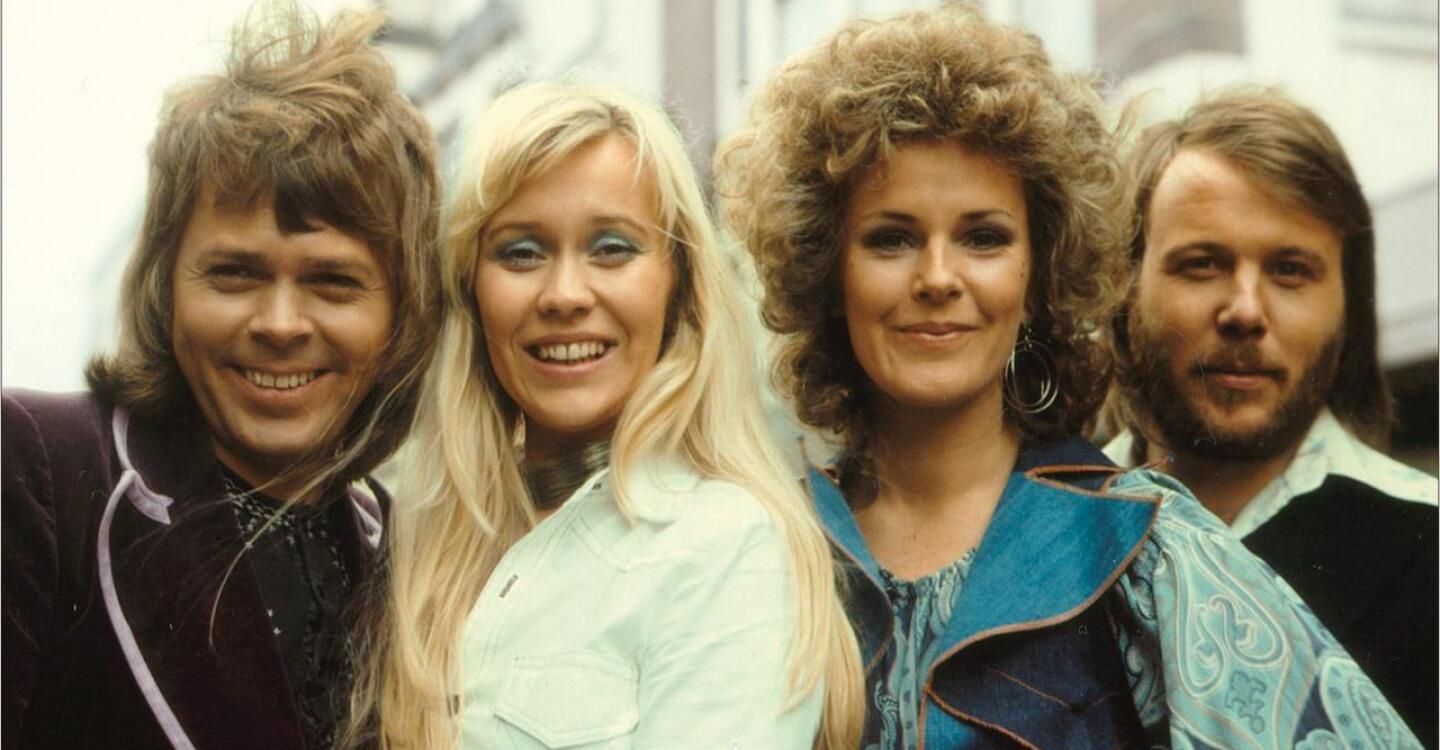 Members of ABBA pose for a picture.