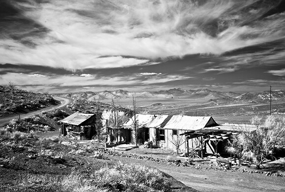 William 'Burro' Schmidt Cabin (at left) and Abandoned Caretaker's Tunnel, Last Chance Canyon, CA, Infrared Exposure, 2011 | Photo: Osceola Refetoff.
