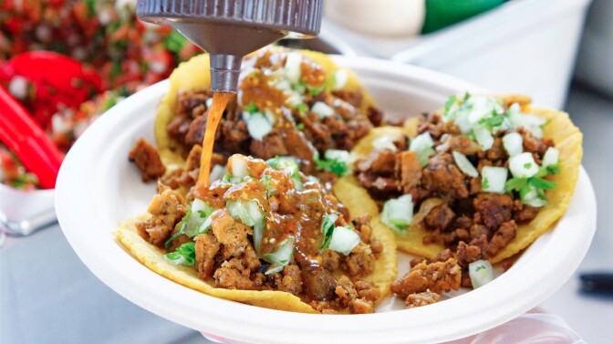 A selection of vegan tacos made with plant-based proteins | Courtesy of Cena Vegan