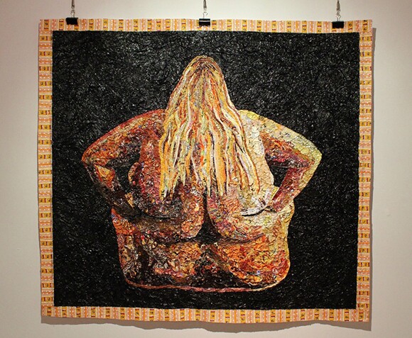 "Postura Consumo," a collage made of fast food wrappers by Pablo Llana. | Photo: Carolina A. Miranda