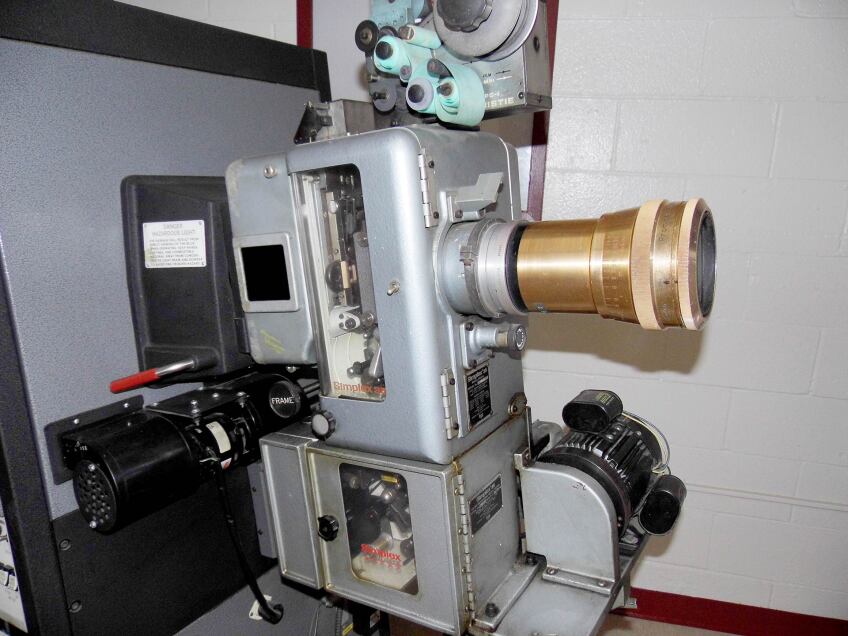 Vineland Drive-In's concession stand has son old projection room equipment on display, like a lamp projector, film winder machine and old reels. | Sandi Hemmerlein
