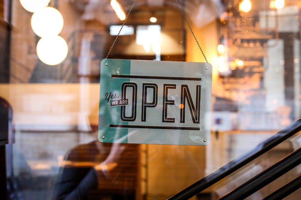Economic Inclusion Initiative - Open sign