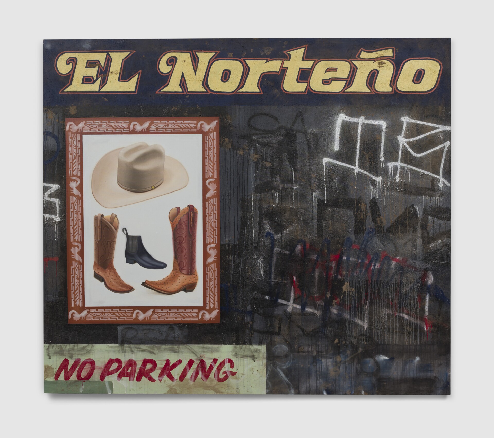 A painting with the words, "El Norteño" in yellow across the top. Below, are cowboy boots and a cowboy hat framed in a Western-style frame. The background is all black covered in graffiti. On the bottom left, in red hand-painted lettering, it reads, "No Parking." 