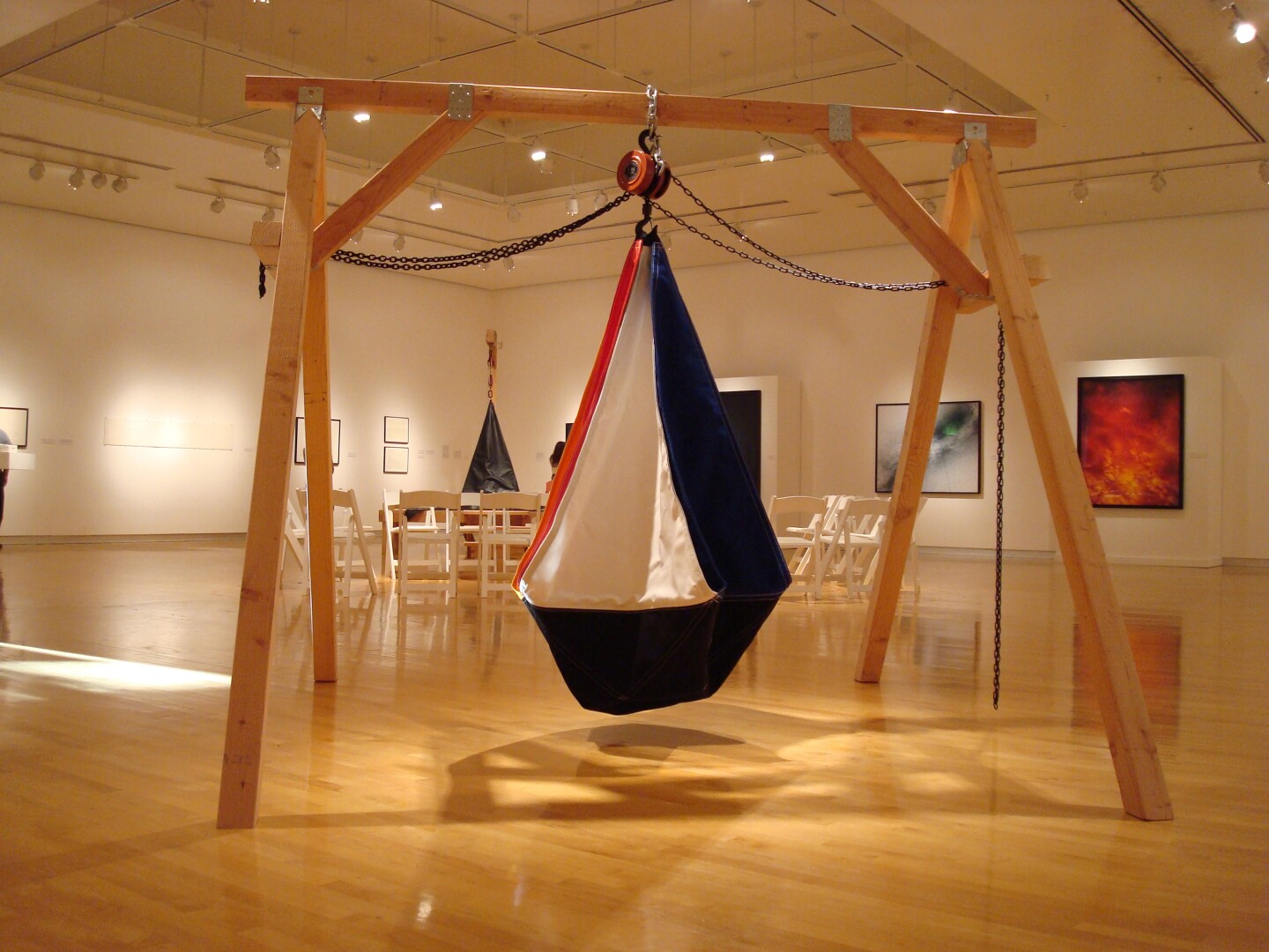 A large sack hangs from a frame.