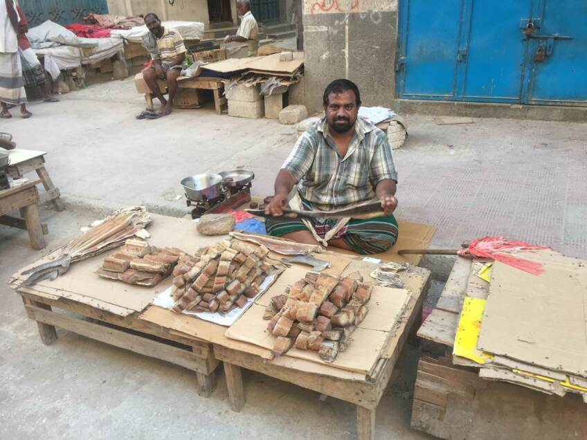 A vendor sells food at the Sharej street market in Mukalla, Yemen, April 26, 2020. | Thomson Reuters Foundation/Saeed Al-Batati