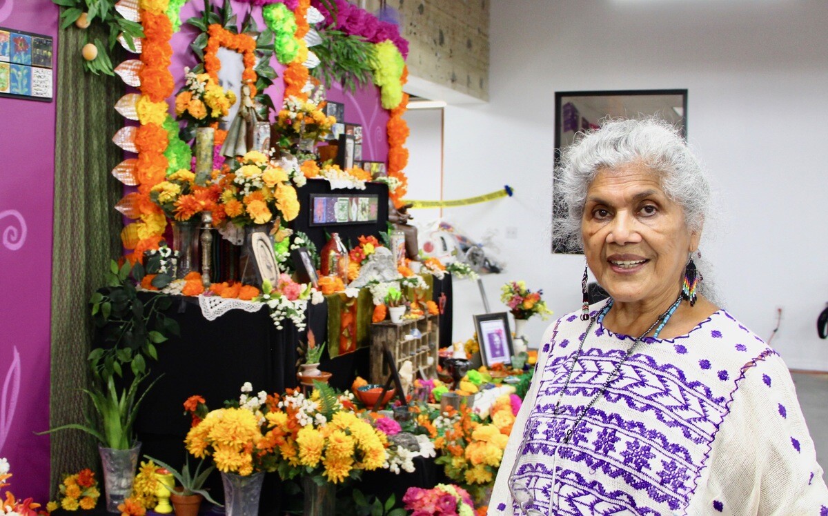 Oferlia Esparza, an altarista, on Dia de los Muertos at Self Help Graphics | Jordan Riefe