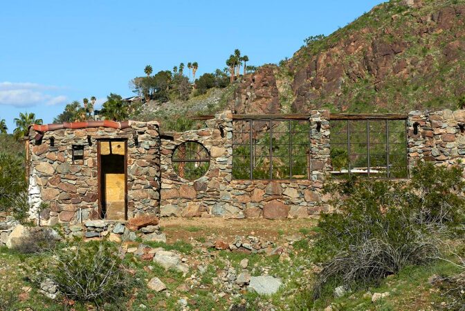 Rock house wall sheltering the Olympic-sized pool (empty today). | Millicent Harvey