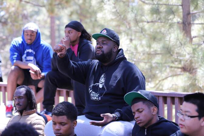 Man in surrounded by fellow BSS members speaks out.