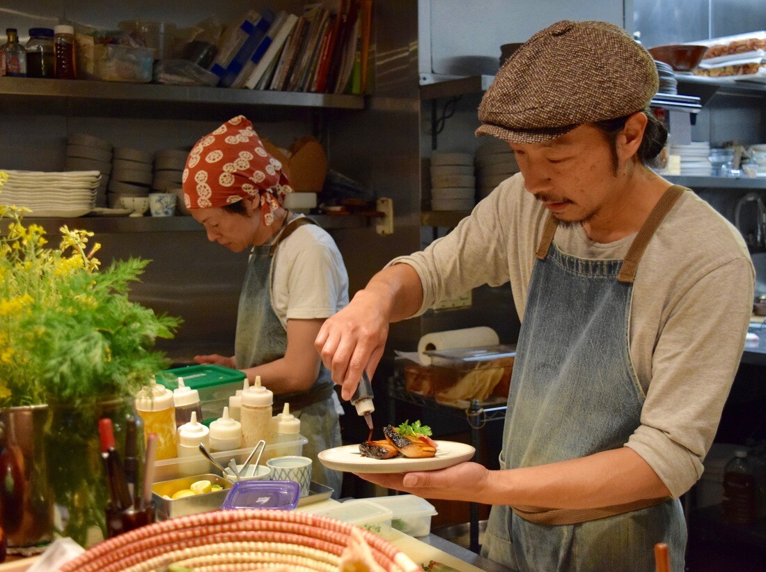 Chef Koyama preparing a dish at Necco