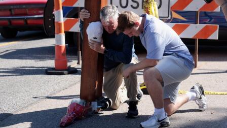 In aftermath of church attack, investigators seek motive