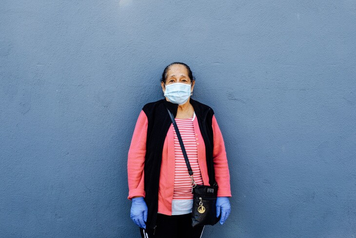 Maria Luisa Rodriguez, a street vendor who sells toys in South Central L.A., hasn't been selling since the stay-at-home orders went into effect. She's relying on the cash card from Inclusive Action for the City to pay her bills. | Chava Sanchez/LAist