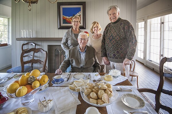 Justice John Gabbert, seated, and Arthur Littleworth, standing with family. | Photo: Douglas McCulloh