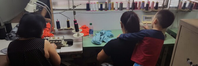 Van Huynh’s mother, sister Rita and nephew Willy sew masks for the Auntie Sewing Squad. | Courtesy of Van Huynh
