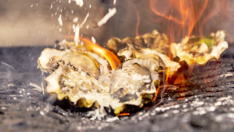 Oysters on the grill at the Manila District in downtown Los Angeles.