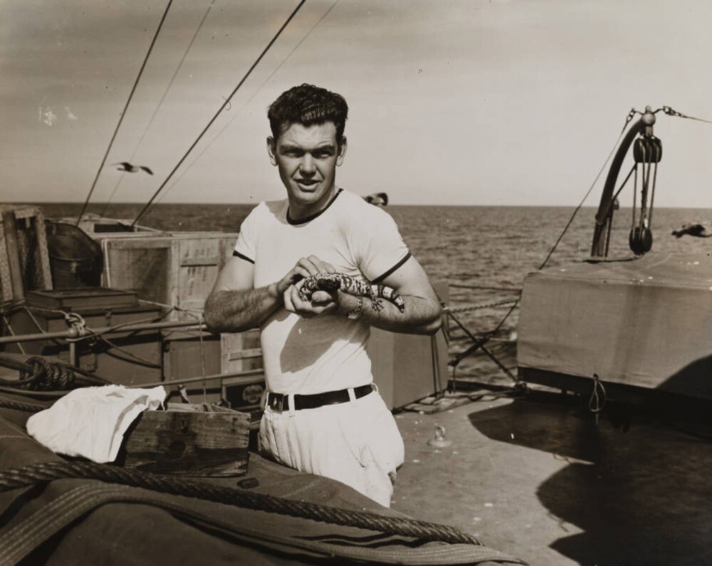 Man with lizard, Velero III, 1931-1941| Allan Hancock Foundation Collection, USC Libraries