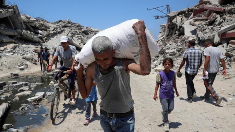 Israel increases food aid to Gaza amid reports of starvation