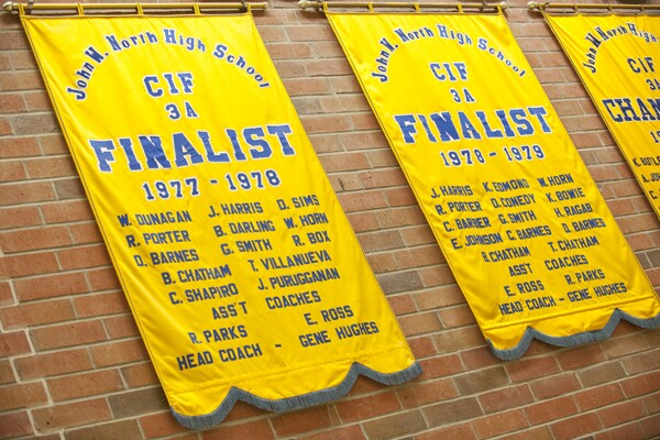 CIF banners - D Sims, T Chatham and their teammates on the wall | Photograph by Douglas McCulloh