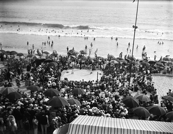 A boxing match takes place on a Southern California beach. From the California Historical Society Collection.