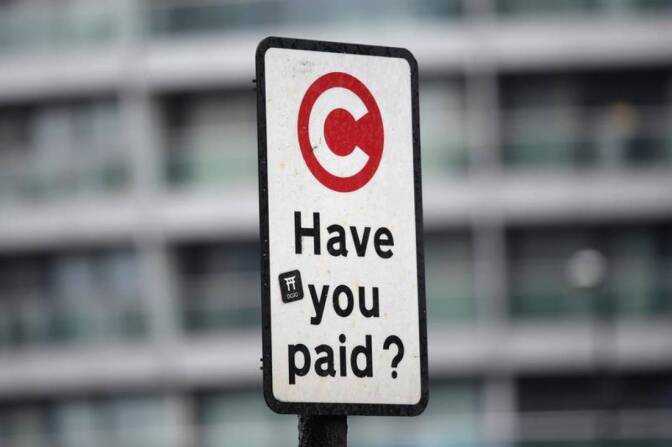 ARCHIVE: A sign indicating the beginning of the congestion charging zone in London, Britain, January 31, 2018. | REUTERS/Toby Melville