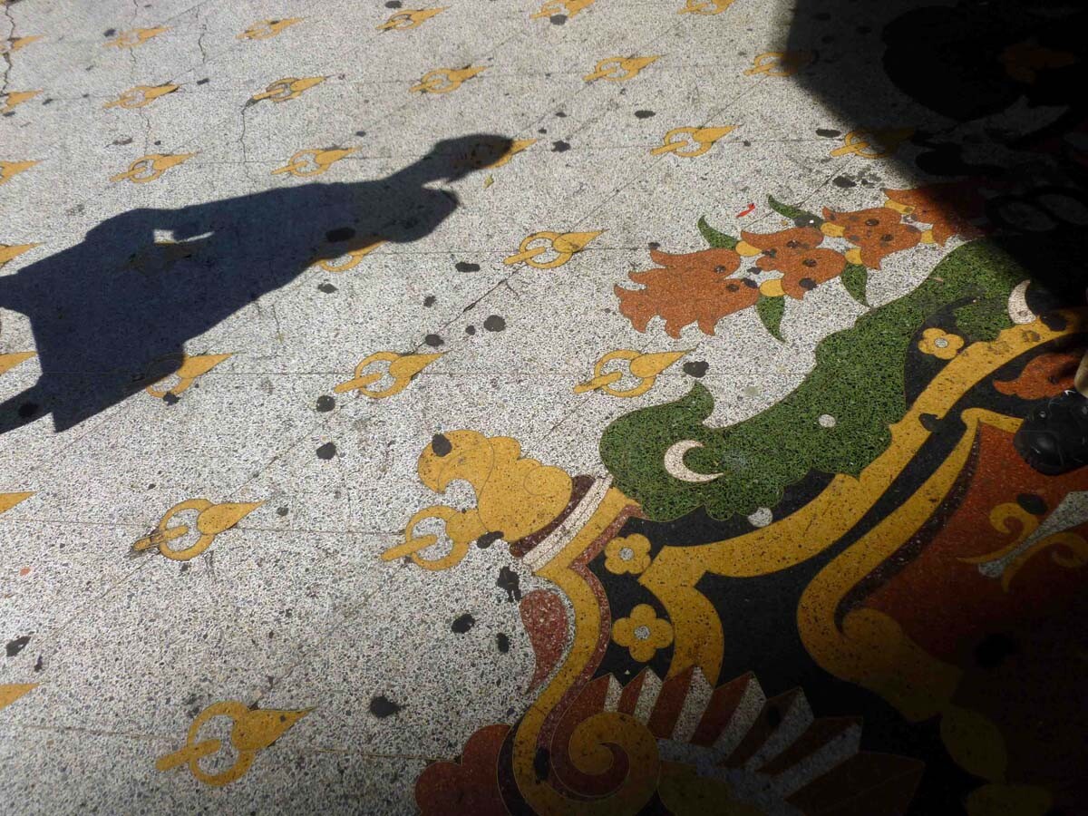 The Los Angeles Theatre's brightly colored terrazzo sidewalk. | Sandi Hemmerlein