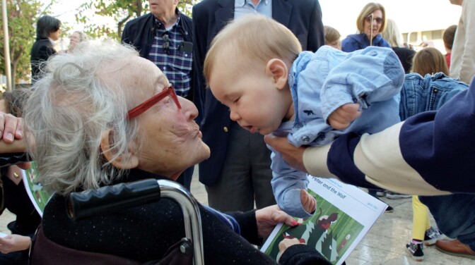 Trudy with one of her great-granchildren | Courtesy of the Lehrer family
