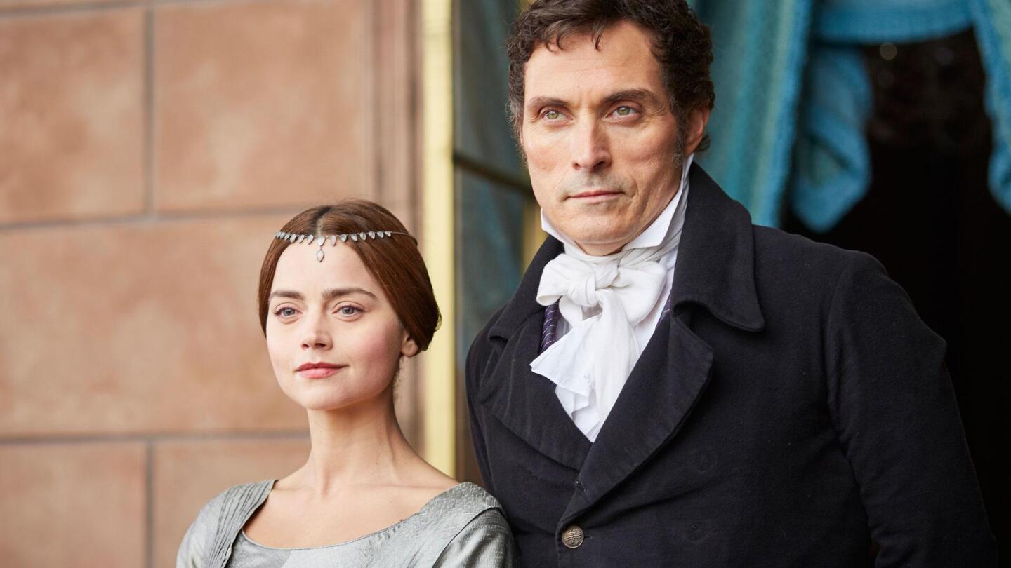 Queen Victoria (Jenna Coleman) and Lord Melbourne (Rufus Sewell) stand side by side. | "Victoria on Masterpiece: The Clockwork Prince"
