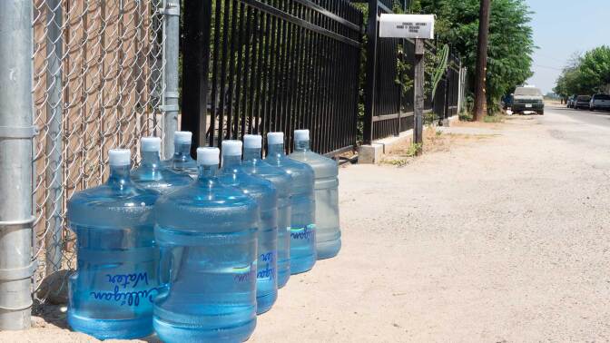 Bottled water is routinely delivered to residents of Tombstone Territory, a cluster of homes in central Fresno County reliant on increasingly scarece groundwater. | Courtesy of the Leadership Counsel for Justice and Accountability