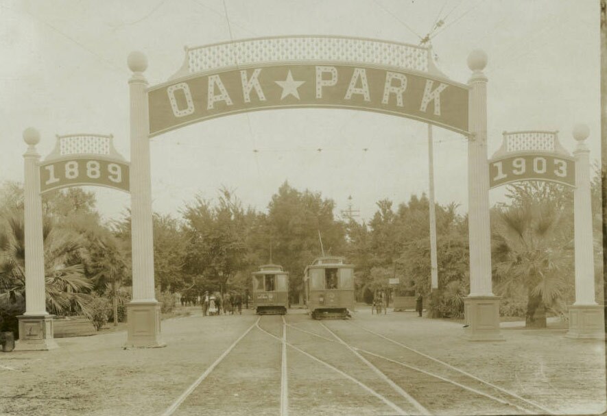 Oak Park in Sacramento, showing trolley cars, ca.1900. / USC Digital Library