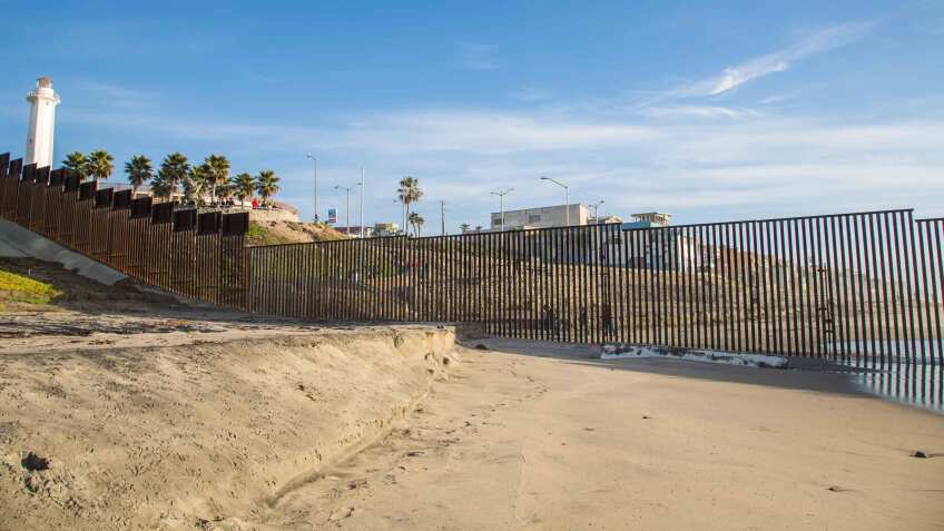 Border fence along the Pacific Ocean south of San Diego