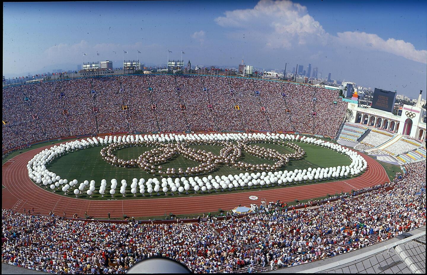 1984 Los Angeles Olympics opening ceremonies showed white balloons ringing around the track and the Olympics symbol.