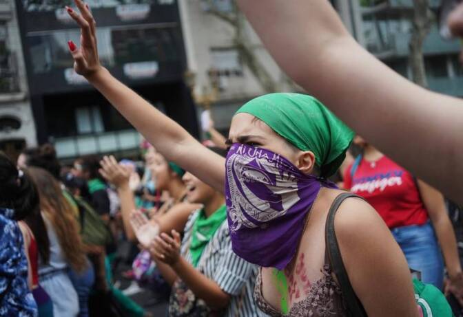 Women gesture during a demonstration in support of women and against gender violence in front of the Palace of the Argentine National Congress, in Buenos Aires, Argentina March 9, 2020. | REUTERS/Mariana Greif