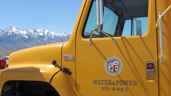 An LADWP truck in the Owens Valley with the Eastern Sierras in the background | Photo by Zach Behrens/KCET