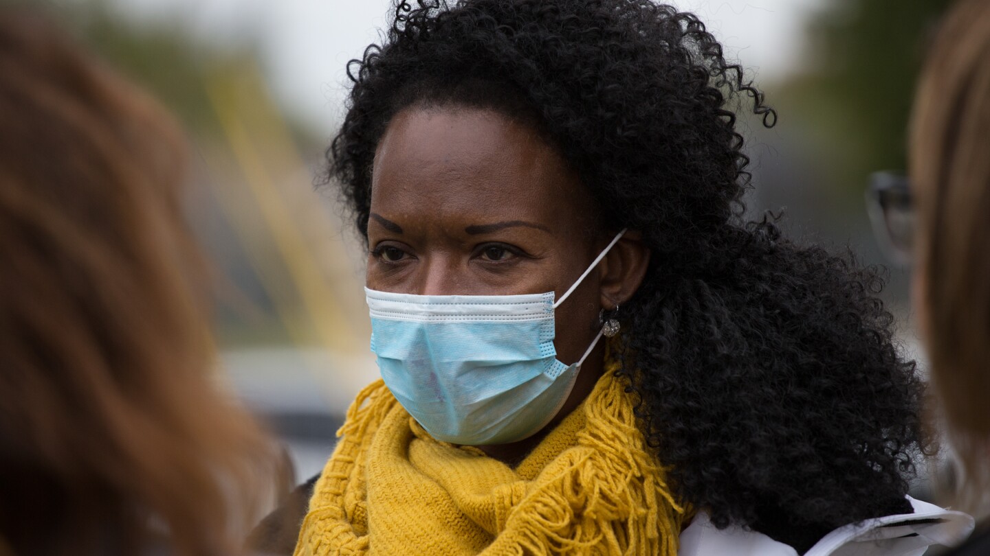 Washington Post reporter DeNeen Brown observes the second mass grave excavation at Tulsa’s Oaklawn Cemetery. 19 October 2020.