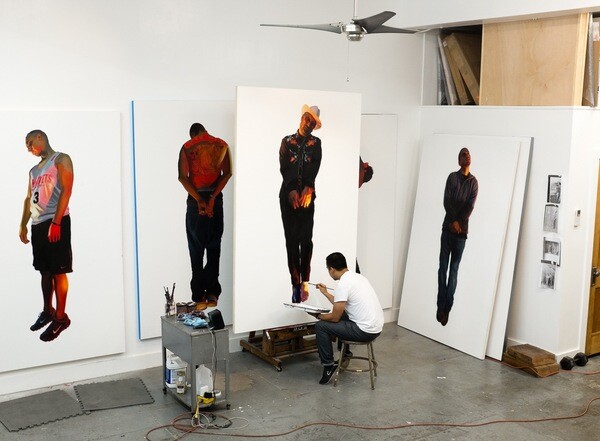 Artist in studio with The Strangest Fruit series I Courtesy of the artist.
