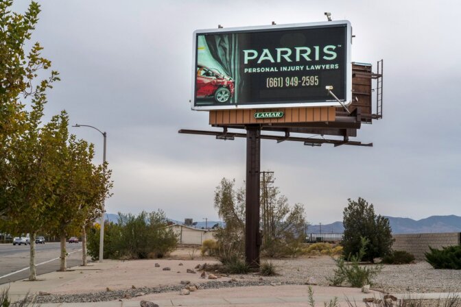 One of several billboards located across Antelope Valley advertising Lancaster Mayor R. Rex Parris’ namesake law firm that specializes in personal injury law. | Kim Stringfellow © 2017